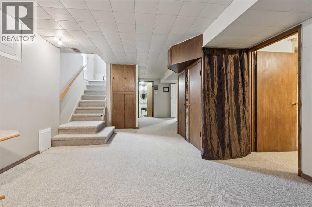 12 Westwood Crescent SW, Calgary, Alberta  T3C 2W6 - Photo 18 - A2298134