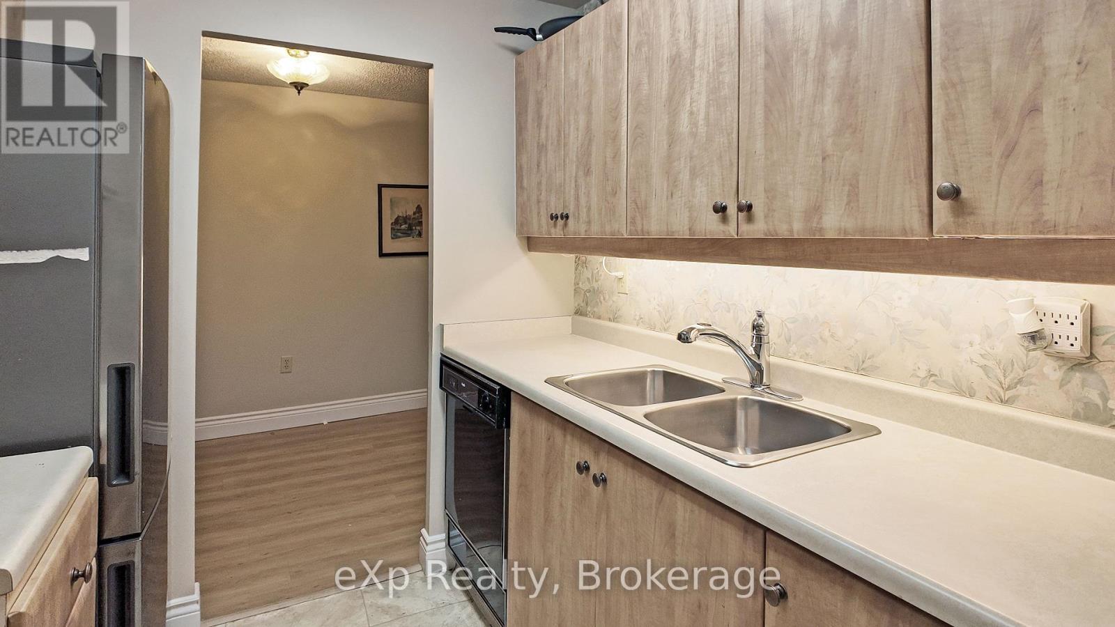 402 - 5 Valleyside Drive, Brockton, Ontario N0G 2V0 - Photo 2 - X12967772