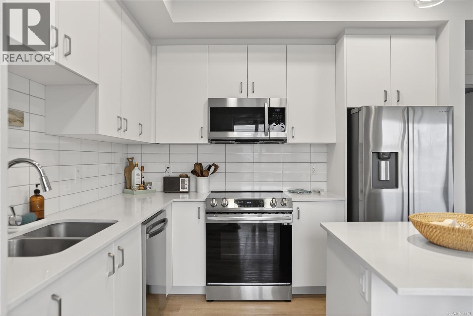 202 120 Jensen Ave E, Parksville, British Columbia  V9P 0H6 - Photo 4 - 1031107