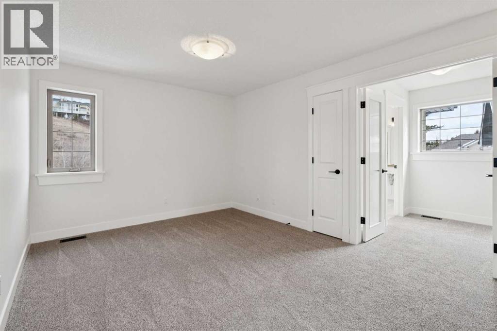 1 Discovery Ridge Link SW, Calgary, Alberta  T3H 4Y1 - Photo 23 - A2291643