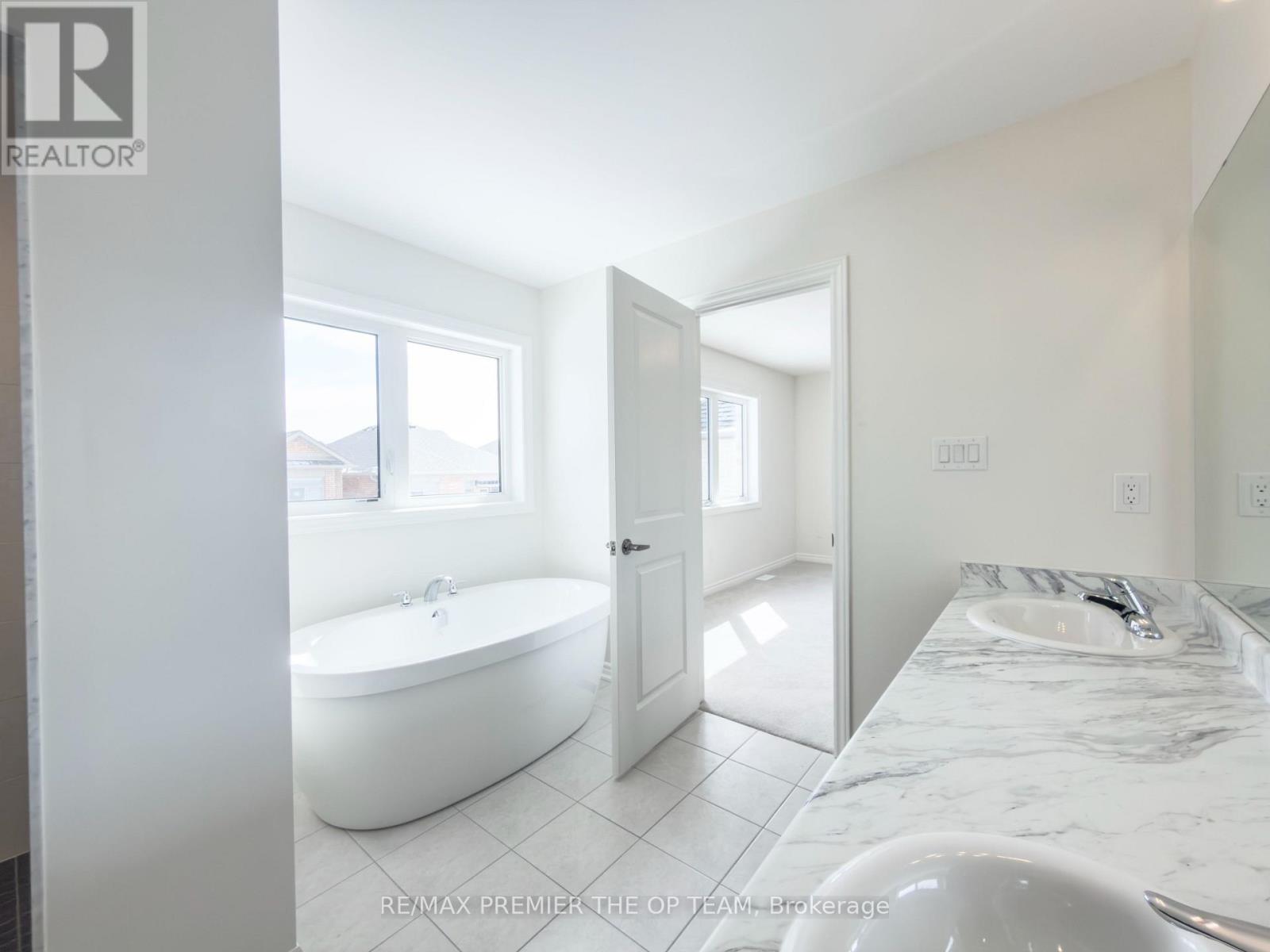 67 Lawrence D. Pridham Avenue, New Tecumseth, Ontario  L9R 0X4 - Photo 13 - N12967700