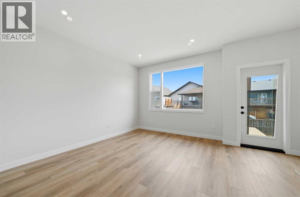 69 Pinnacle Close, Blackfalds, Alberta  T4M 0M3 - Photo 6 - A2298357