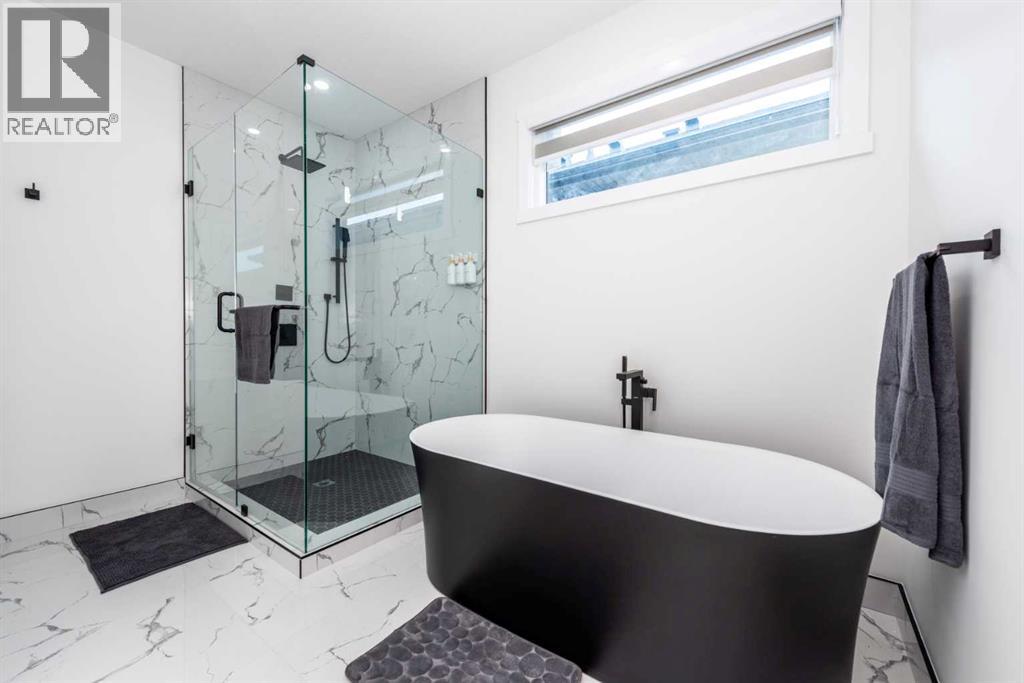 31 Harvard Street NW, Calgary, Alberta  T2K 2B5 - Photo 30 - A2288389