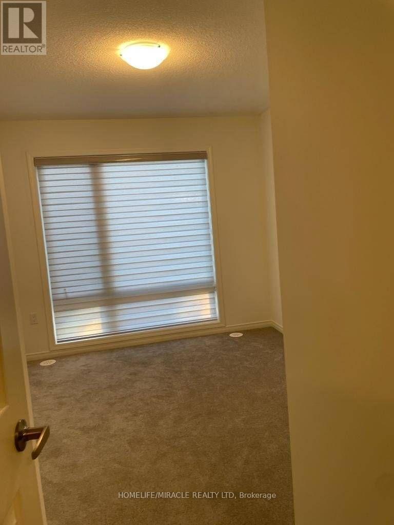 1392 Coral Springs Path, Oshawa, Ontario  L1K 3G1 - Photo 7 - E12967876