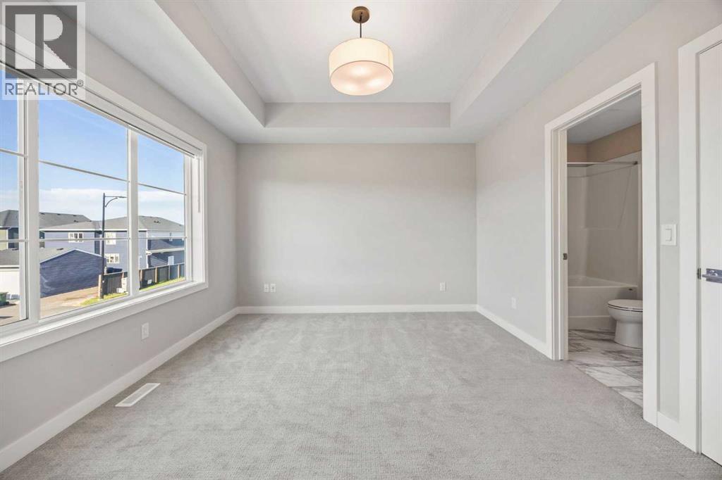 204 Chelsea Manor, Chestermere, Alberta  T1X 2P5 - Photo 19 - A2278772