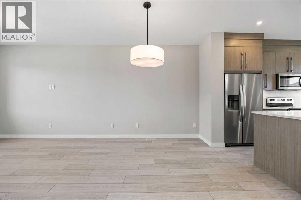 204 Chelsea Manor, Chestermere, Alberta  T1X 2P5 - Photo 10 - A2278772