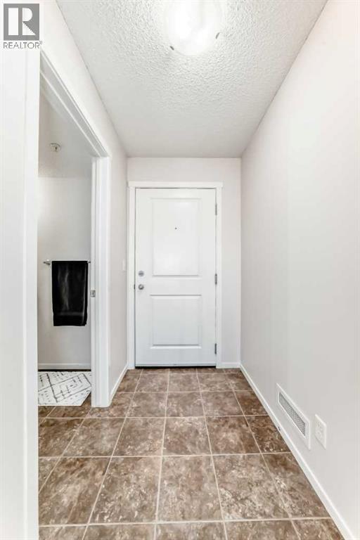 2324, 81 Legacy Boulevard SE, Calgary, Alberta  T2X 2B9 - Photo 3 - A2284807