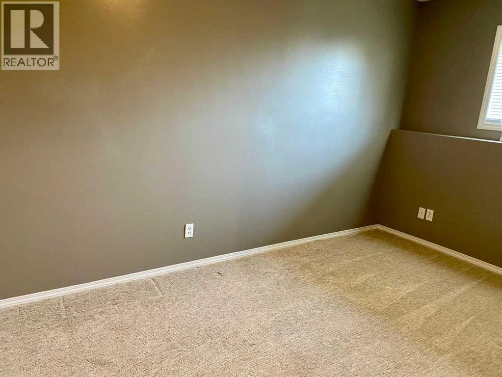 4, 5 Tartan Boulevard W, Lethbridge, Alberta  T1J 4Y5 - Photo 8 - A2299777