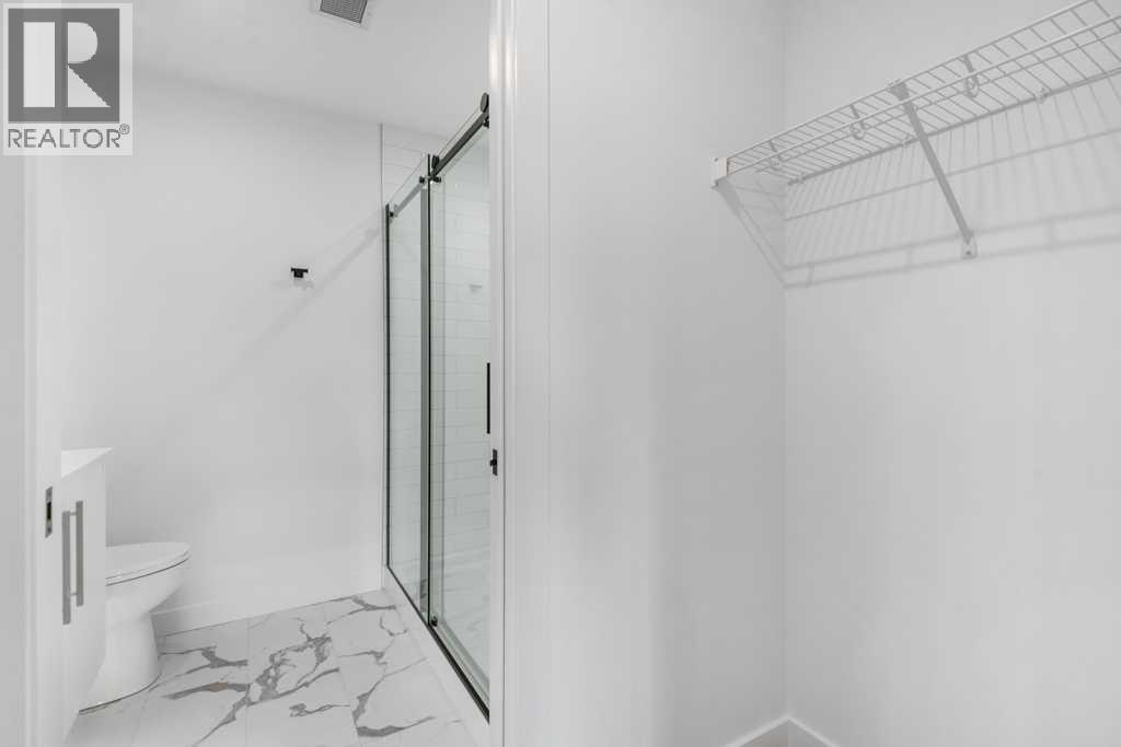 306, 8375 Broadcast Avenue, Calgary, Alberta  T3H 6L3 - Photo 21 - A2284506