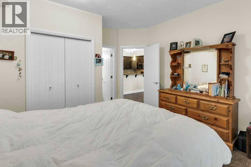 2104, 15 Sunset Square, Cochrane, Alberta  T4C 0E7 - Photo 22 - A2299363