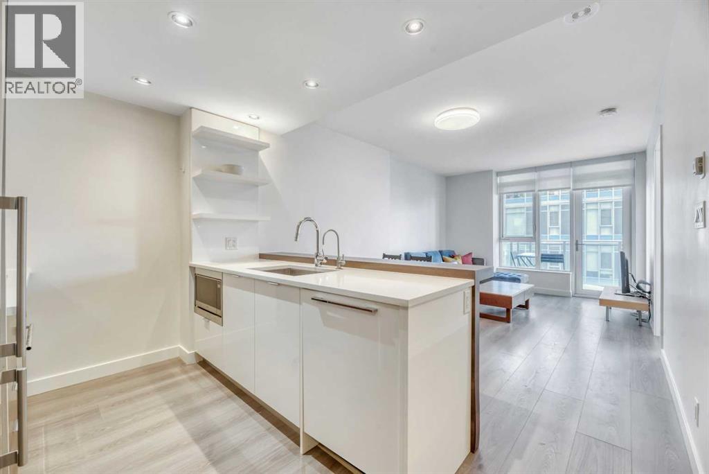 606, 108 Waterfront Court SW, Calgary, Alberta  T2P 1K7 - Photo 4 - A2297186