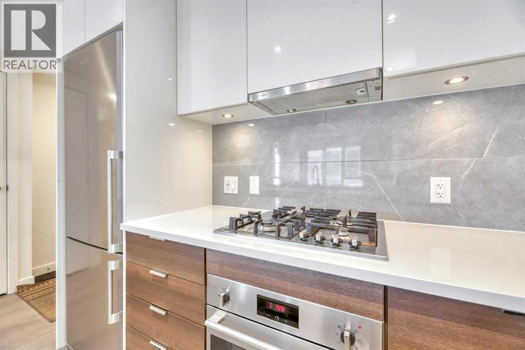 606, 108 Waterfront Court SW, Calgary, Alberta  T2P 1K7 - Photo 2 - A2297186