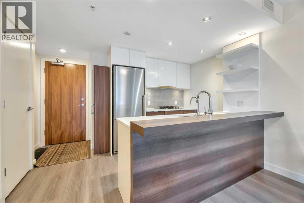 606, 108 Waterfront Court SW, Calgary, Alberta  T2P 1K7 - Photo 3 - A2297186