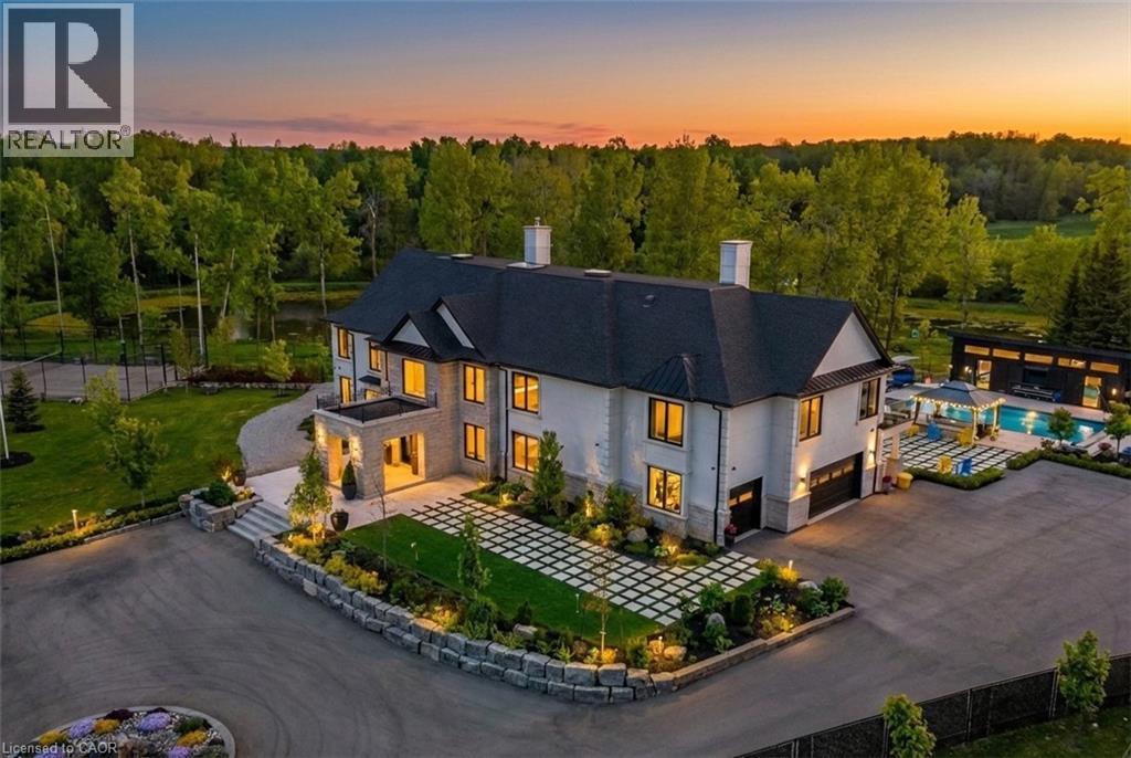 <div class="slider-price">$6,280,000</div><p>13311 Sixth Line Nassagaweya, Milton, Ontario</p>