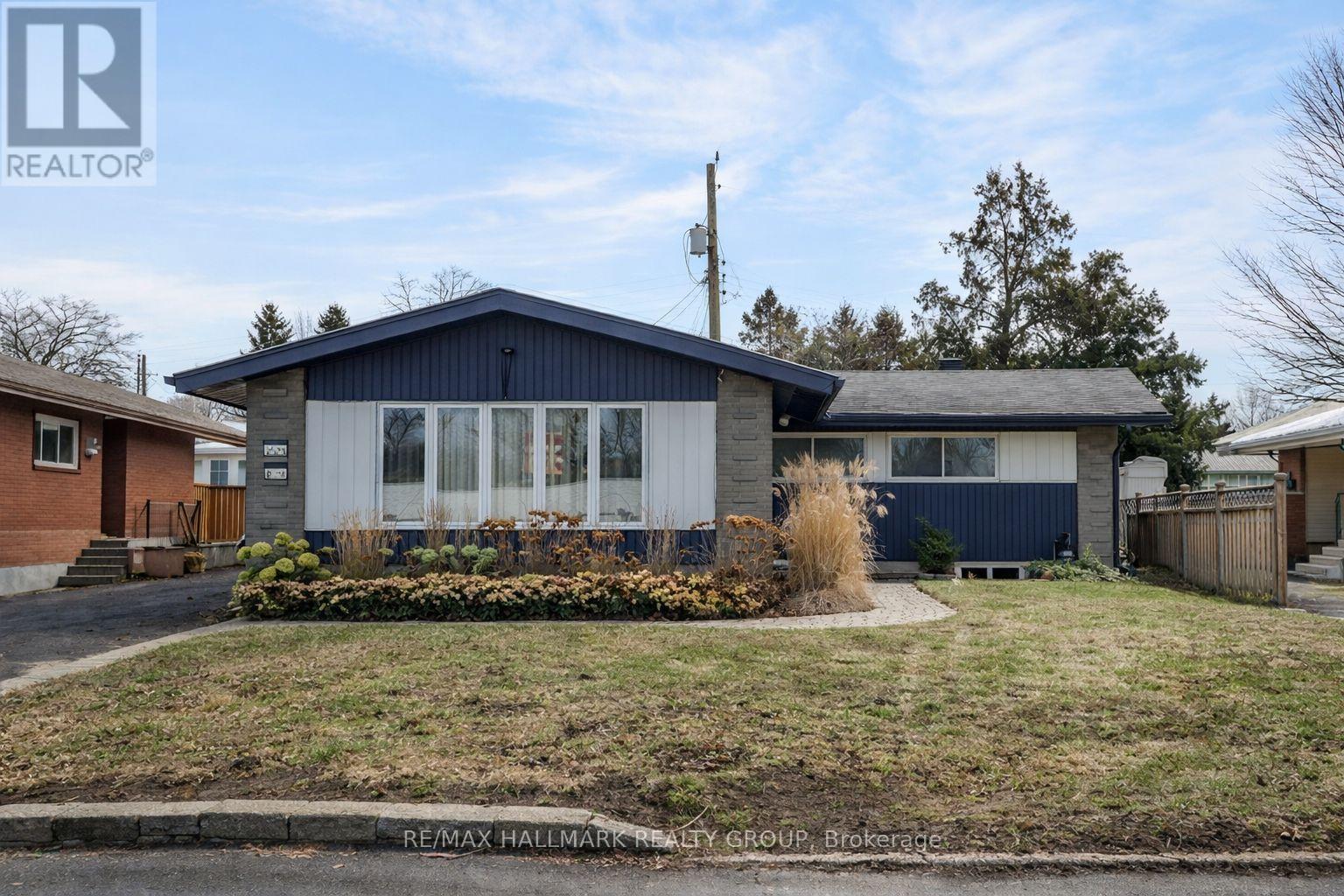 High-Yield Legal Duplex/ Homeowner Mortgage Helper/ Multi-Generational /Shared First-Time Home-owning. This versatile property offers a rare "choose your own future" investment, functioning perfectly as a high-yield ready-to-go legal duplex, a mortgage-slashing primary residence with a built-in rental, a spacious and well-appointed multi-generational home, or a premier co-ownership opportunity with friends or family. Parkway Park convenience meets rare flexibility in a connected west-end location close to parks, paths, recreation, shopping, dining, Algonquin College, College Square, Queensway Carleton Hospital, quick Hwy 417 access and the O-Train Iris Station. Walk, run or bike to nearby green spaces and everyday amenities, then enjoy fast connections across the city. This modern, renovated bungalow with a legal secondary dwelling unit offers a hard-to-find mix of space, versatility and income-support potential. Approx. 1,380 sq ft, Unit B: 1,100 sq ft of finished space. 5,210 sq ft lot. Rare 8-bedroom (4+4), 2 kitchens, 2 laundries, 4.5-baths, separate entrances, separate hydro meters, central air, upgraded insulation, 3 parking spaces, patio, 2 sheds and a large sunny private yard. Beyond the flexibility, this is a home with strong curb appeal and attractive, cohesive renovations. Updates from 2020-2024 include legal lower-unit creation, hardwired smoke detectors, basement windows plus egress, HWT, exterior lighting / security, attic ventilation improvements, exterior paint and brick repairs, new fence & gate, patio and walkway improvements. Owned extra-large 100-gallon 2021 Hot Water Tank is sized to support the home's multiple showers, laundries and kitchens. Upper unit is vacant and was professionally cleaned and painted in March 2026, creating immediate flexibility. Lower-level occupancy details, legal SDU information, lease summary, permits, brochure, full update list and neighbourhood highlights available upon request. OPEN HOUSE Sunday April 12, 2-4pm. (id:48254)