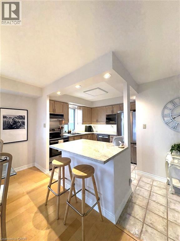 301 Frances Avenue Unit# 1407, Stoney Creek, Ontario  L8E 3W6 - Photo 6 - 40818524