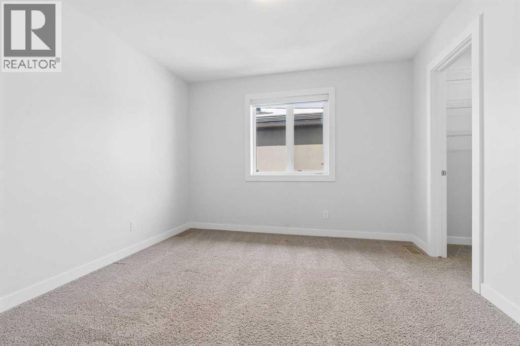 120 Aspen Dale Way SW, Calgary, Alberta  T3H 0S1 - Photo 31 - A2296387