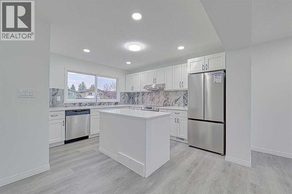 404 Pinehill Road Ne, Calgary, Alberta  T1Y 2M6 - Photo 5 - A2287650