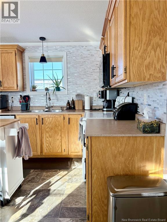 36 Soucy Street, Saint-Léonard, New Brunswick  E7E 2V4 - Photo 3 - NB136681