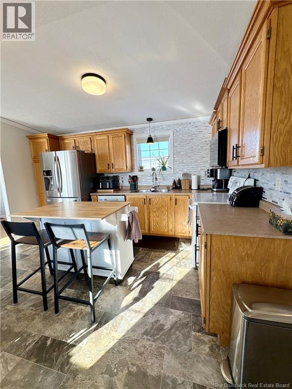 36 Soucy Street, Saint-Léonard, New Brunswick  E7E 2V4 - Photo 2 - NB136681