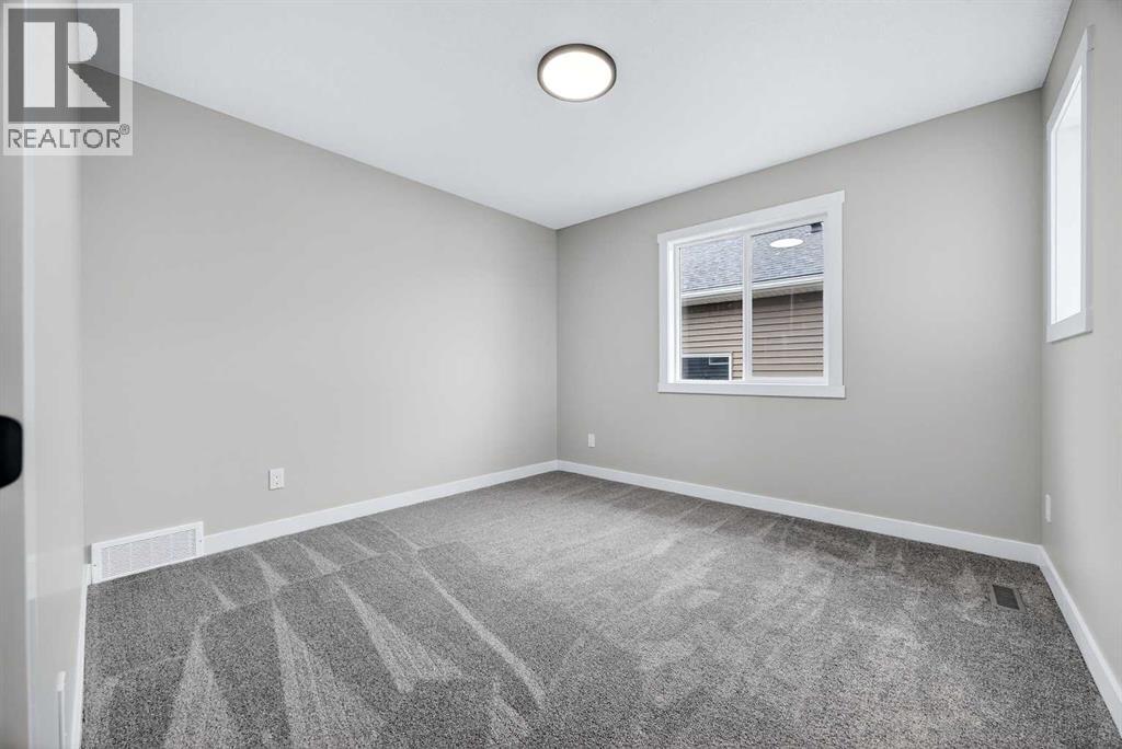 218 Bayview Park Sw, Airdrie, Alberta  T4B 3B1 - Photo 37 - A2298006