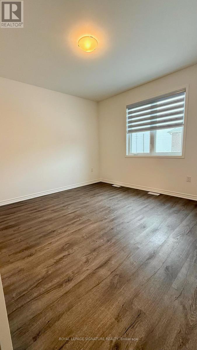 1704 Dance Court, Milton, Ontario  L9E 2A3 - Photo 16 - W12969612