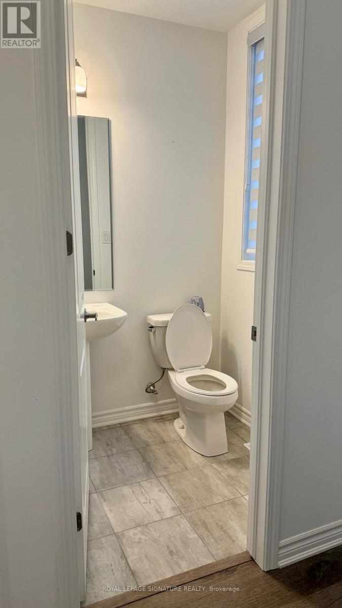 1704 Dance Court, Milton, Ontario  L9E 2A3 - Photo 5 - W12969612