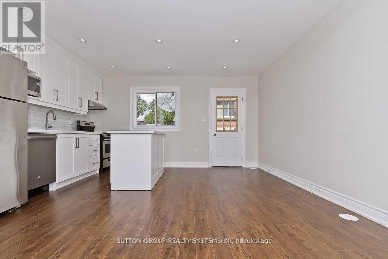 #1 - 20 1/2 Delaney Crescent, Toronto (Little Portugal), Ontario  M6K 1R2 - Photo 2 - C12970466