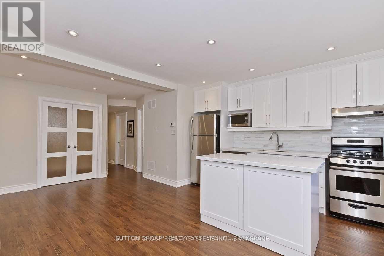 #1 - 20 1/2 Delaney Crescent, Toronto (Little Portugal), Ontario  M6K 1R2 - Photo 3 - C12970466