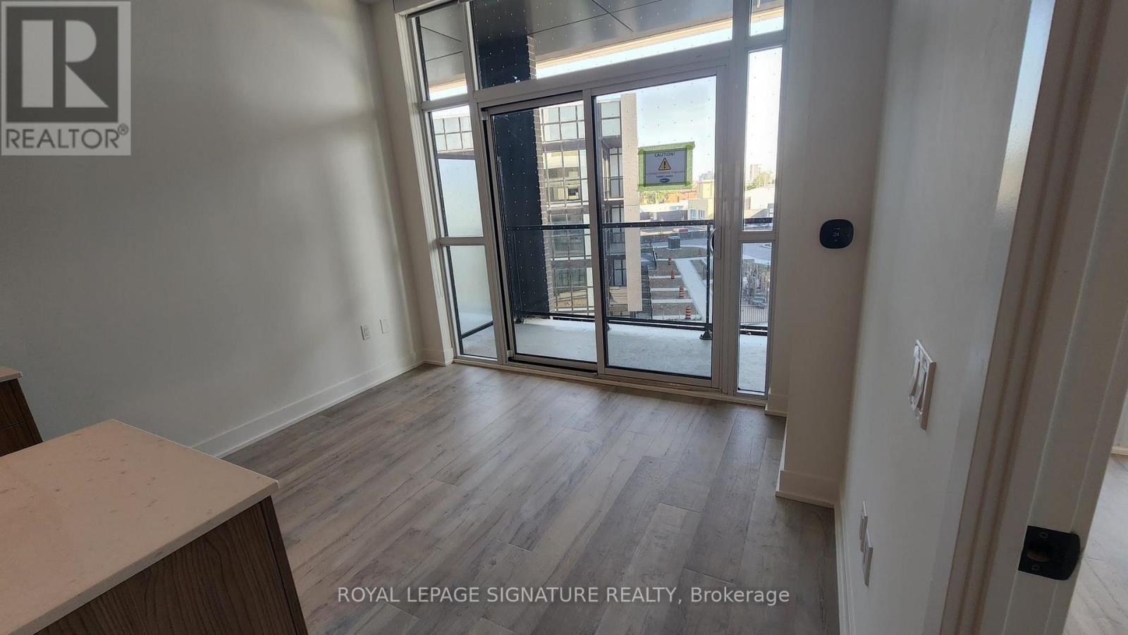 311 - 60 George Butchart Drive, Toronto, Ontario  M3K 0A7 - Photo 4 - W12970394