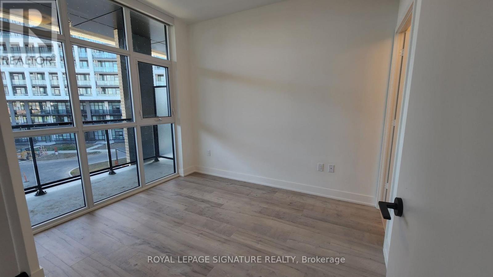 311 - 60 George Butchart Drive, Toronto, Ontario  M3K 0A7 - Photo 5 - W12970394