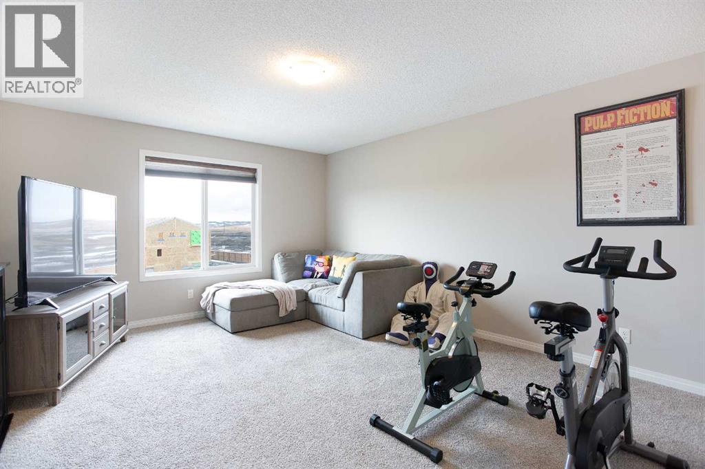 63 Heritage Court, Cochrane, Alberta  T4C 2N5 - Photo 27 - A2288398