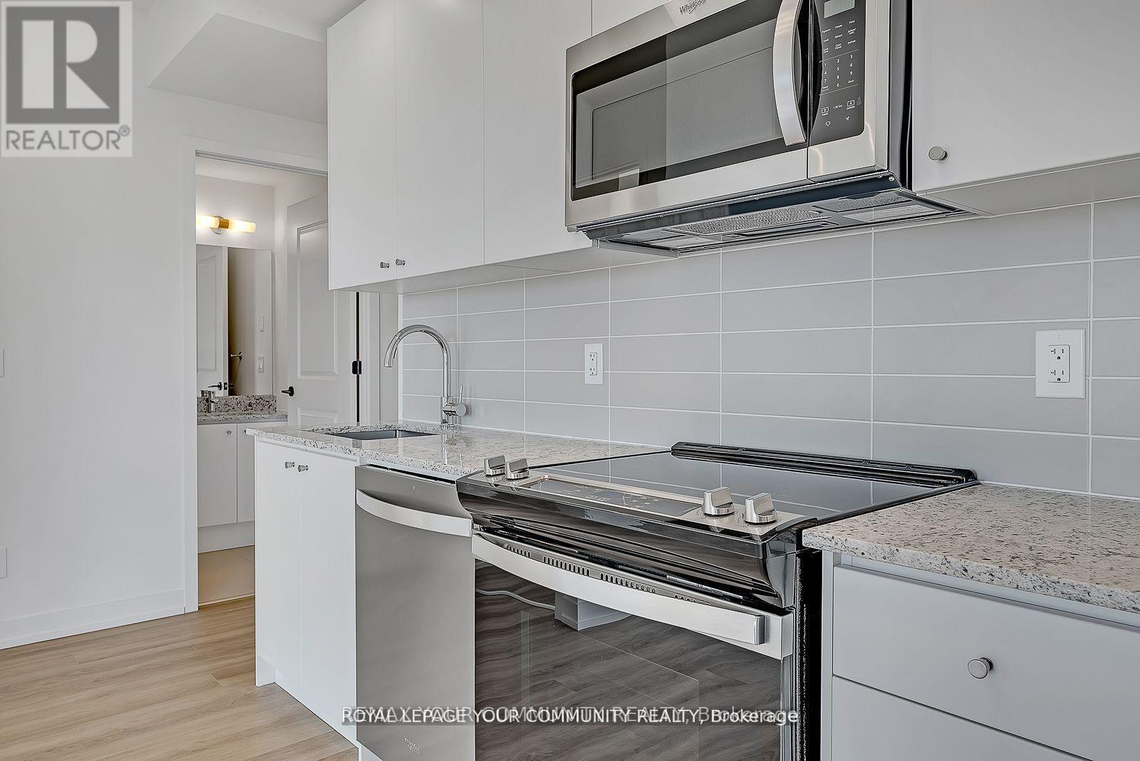 804 - 345 Wheat Boom Drive, Oakville, Ontario  L6H 7X5 - Photo 2 - W12970812