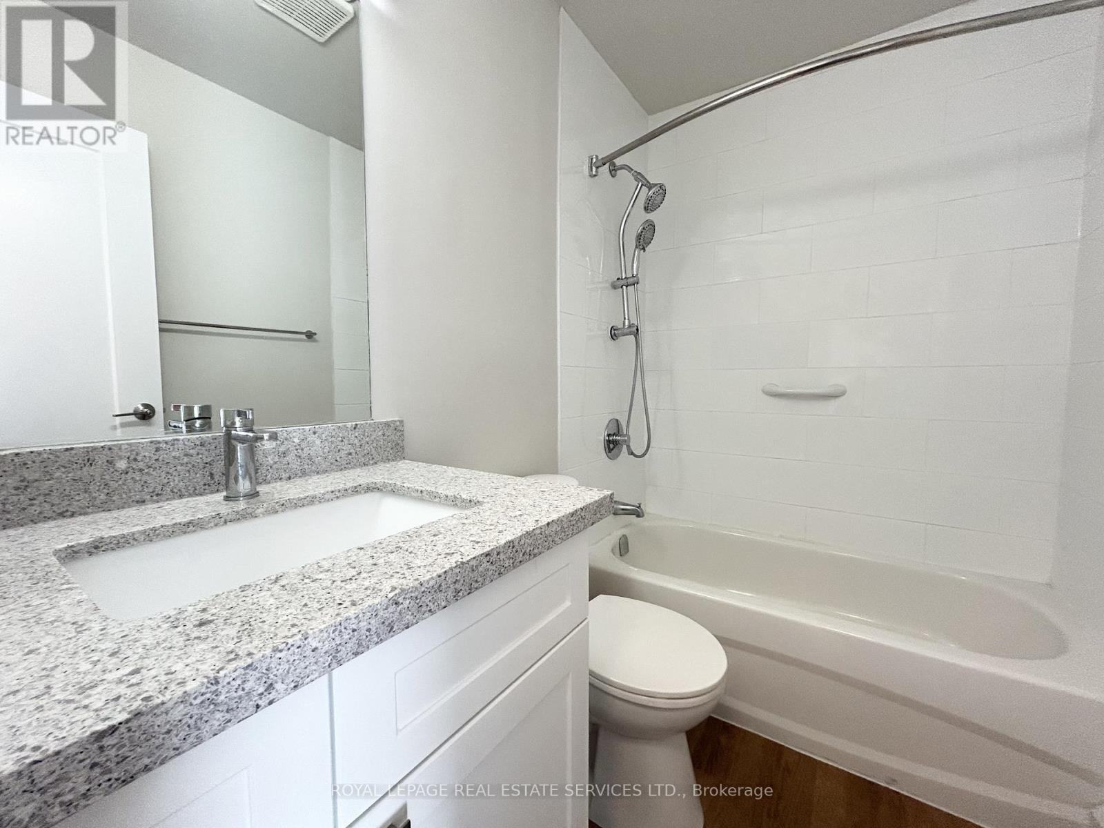 303 - 82 Millside Drive, Milton, Ontario  L9T 4A1 - Photo 12 - W12971174