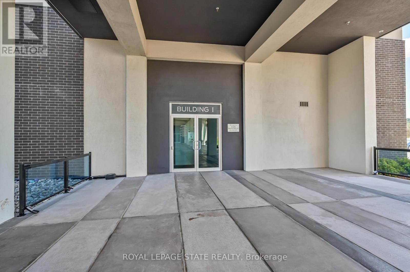 231 - 16 Concord Place, Grimsby, Ontario  L3M 4E8 - Photo 3 - X12971112