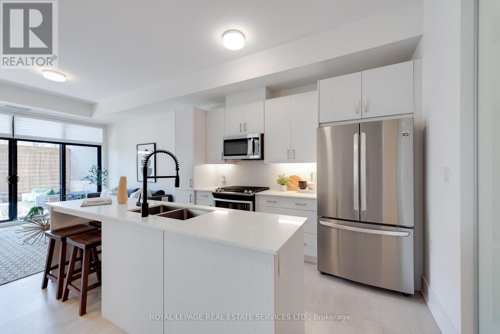 101 - 14 Dewhurst Boulevard, Toronto, Ontario  M4J 3H9 - Photo 7 - E12971410