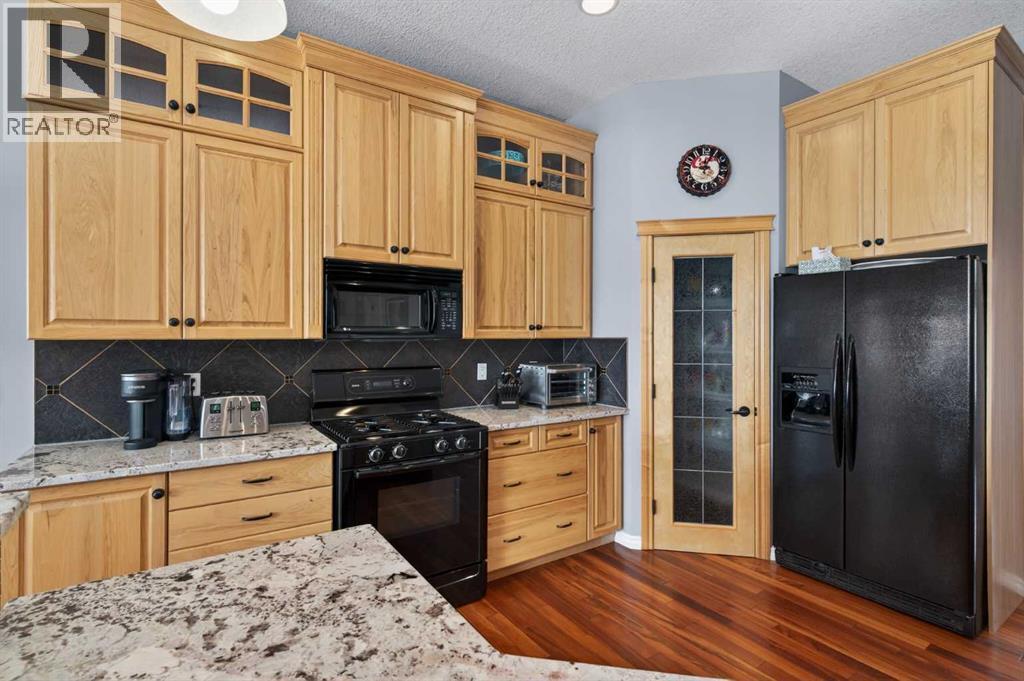 77 Crystal Green Drive, Okotoks, Alberta  T1S 2N8 - Photo 13 - A2290646