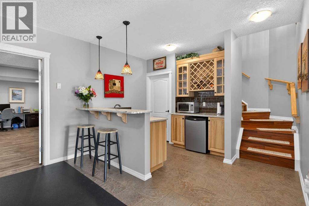 77 Crystal Green Drive, Okotoks, Alberta  T1S 2N8 - Photo 31 - A2290646