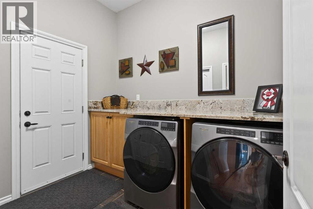 77 Crystal Green Drive, Okotoks, Alberta  T1S 2N8 - Photo 27 - A2290646