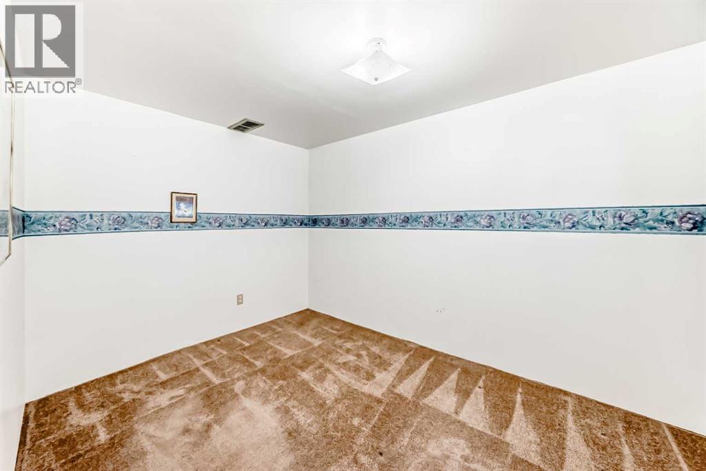 1837 Meadowbrook Drive Se, Airdrie, Alberta  T4A 1V5 - Photo 30 - A2287190