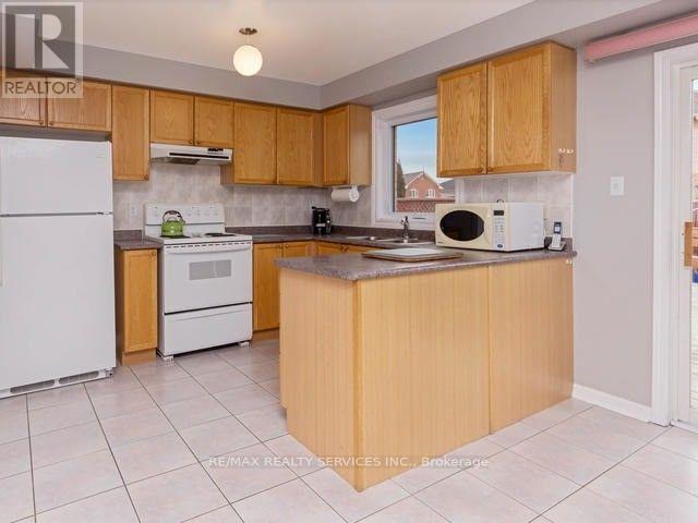 32 Silo (Upper) Court, Brampton, Ontario  L6X 4S4 - Photo 6 - W12971292