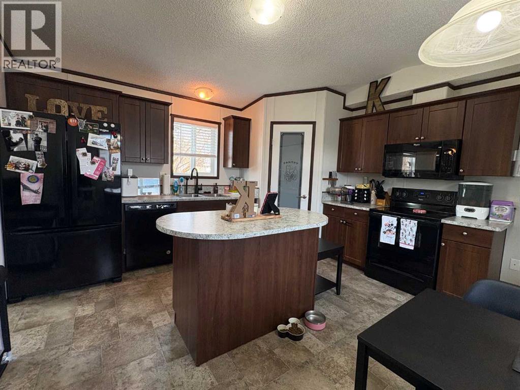 71, 4000 Minto Street, Penhold, Alberta  T0M 1R0 - Photo 5 - A2298878