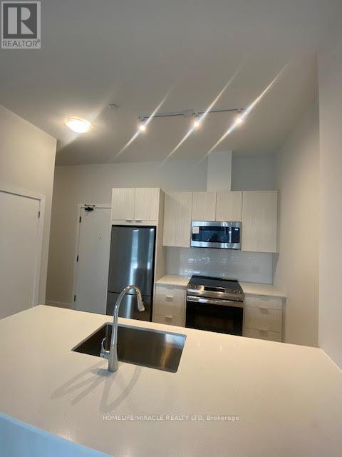 513 - 430 Square One Drive, Mississauga, Ontario  L5B 3Y1 - Photo 2 - W12971810