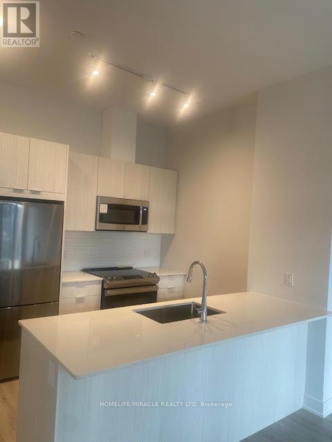 513 - 430 Square One Drive, Mississauga, Ontario  L5B 3Y1 - Photo 4 - W12971810