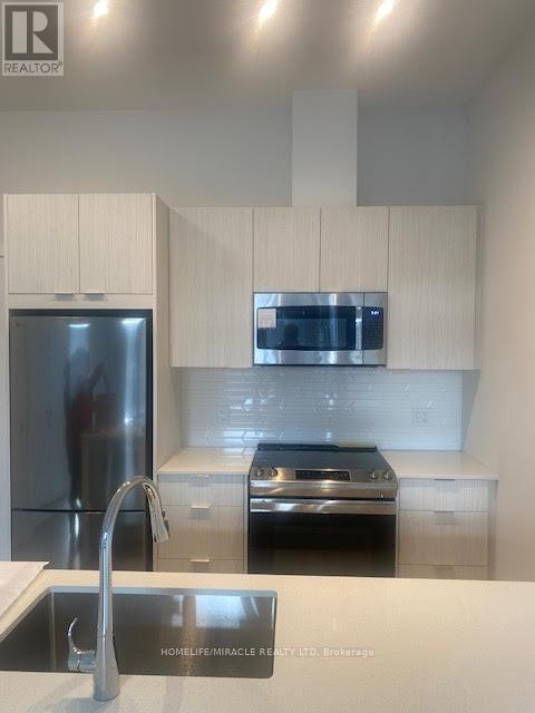 513 - 430 Square One Drive, Mississauga, Ontario  L5B 3Y1 - Photo 6 - W12971810