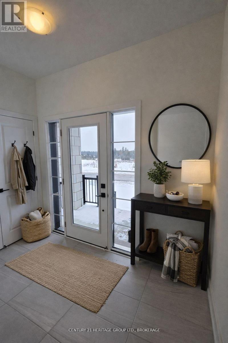 66 Dusenbury Drive, Loyalist, Ontario  K0H 2H0 - Photo 2 - X12972206