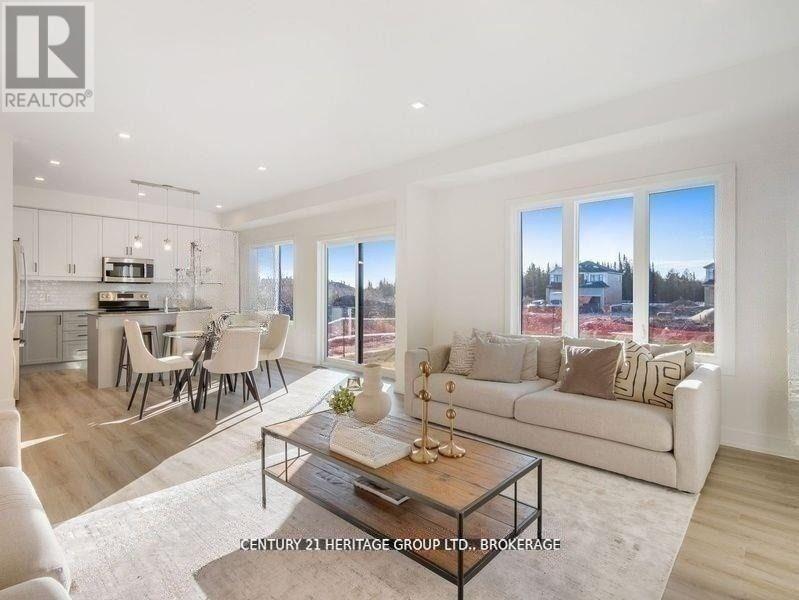 78 Dusenbury Drive, Loyalist, Ontario  K0H 2H0 - Photo 2 - X12972226