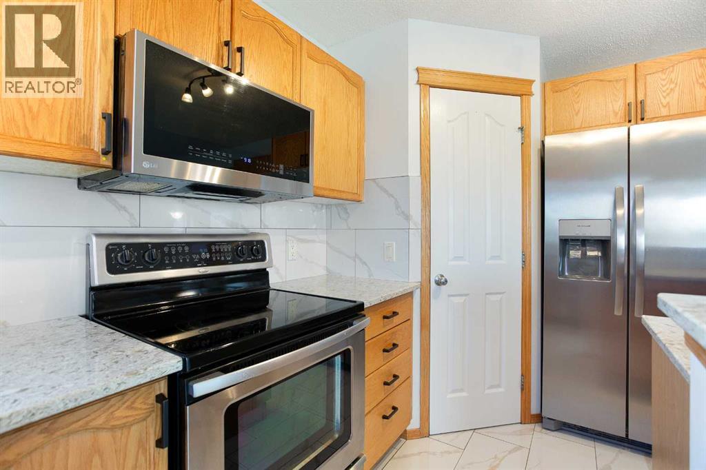 26 Cresthaven View Sw, Calgary, Alberta T3B 5Y2 - Photo 8 - A2271425