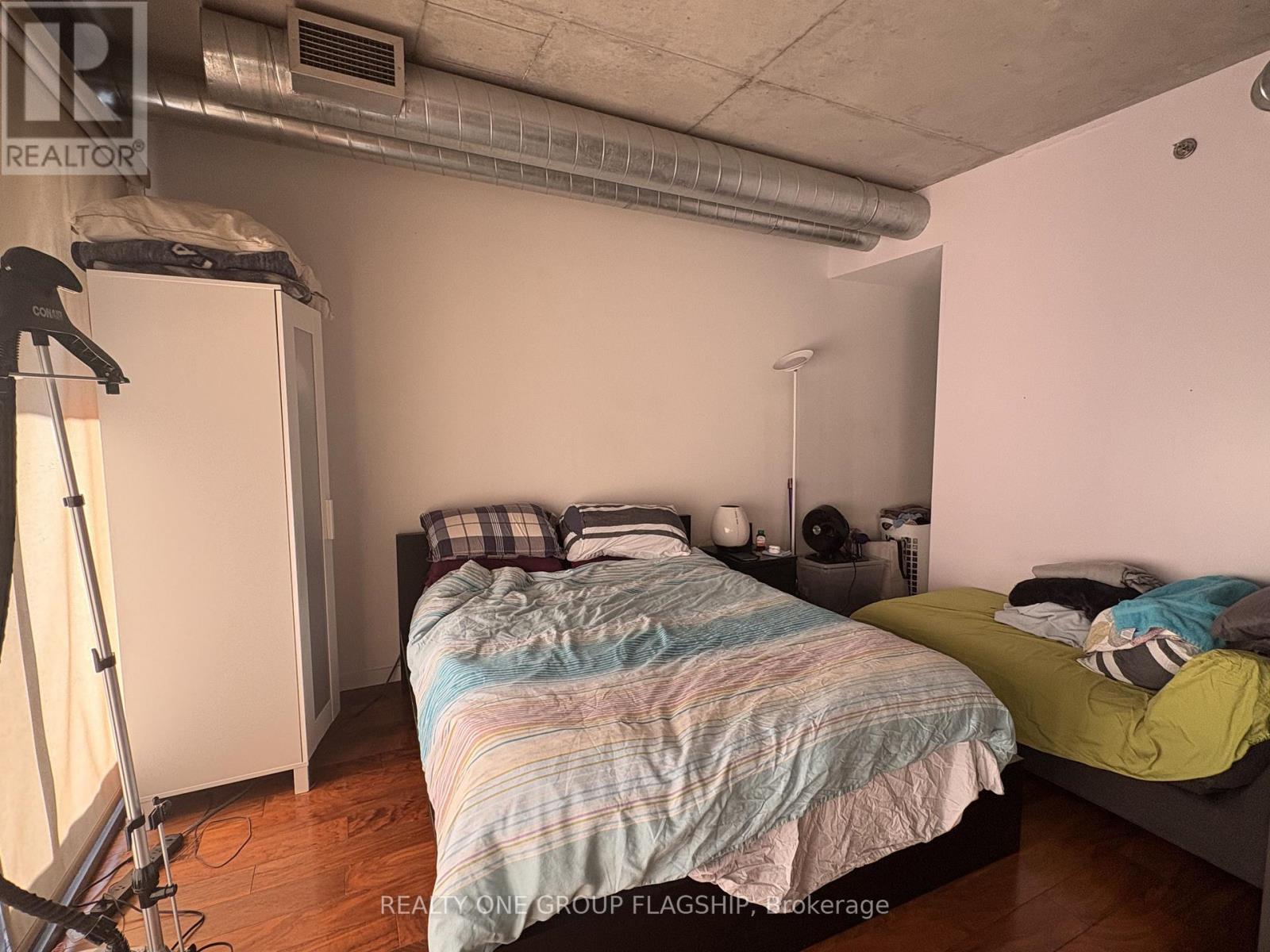 409 - 32 Trolley Crescent, Toronto, Ontario  M5A 0E8 - Photo 8 - C12972126