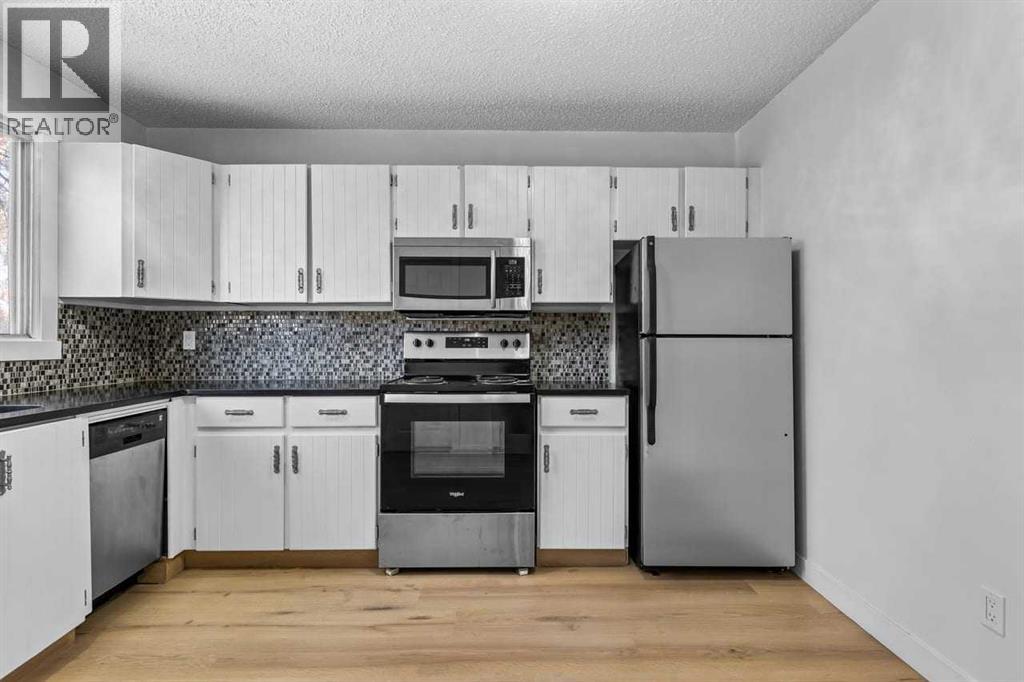 7006a Bowness Road Nw, Calgary, Alberta  T3B 0G4 - Photo 10 - A2292682